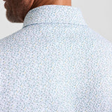 WHITE PRINTED PERFORMANCE POLO - SWEATERED SWAG